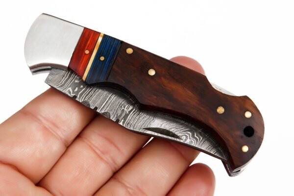 Folding pocket knife with rose wooden handle and damascus blade